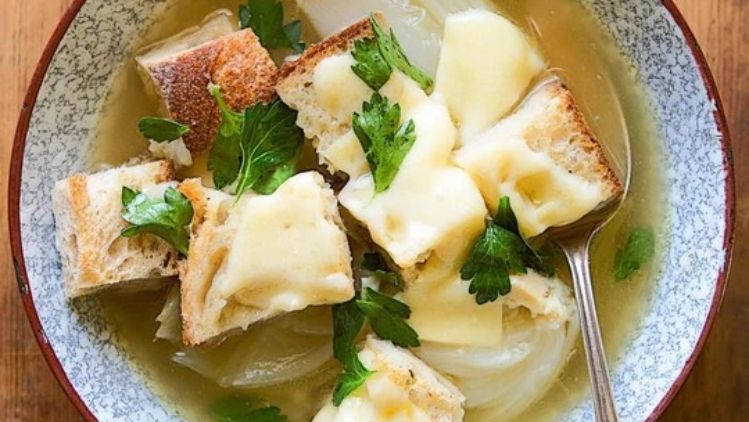 Panade with Wagon Wheel cheese and onion garlic confit, baked until golden and bubbling for a rich and comforting rustic casserole.