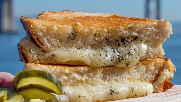 Truffle grilled cheese sandwich made with artisan cheese and crusty sourdough bread, toasted until golden and filled with rich, melty flavor.