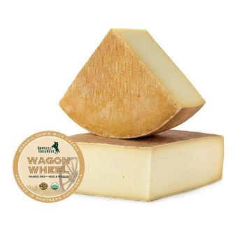 Wagon Wheel artisan cheese showcases a smooth, firm texture and rich flavor, crafted from organic cow’s milk and aged to perfection in Northern California.