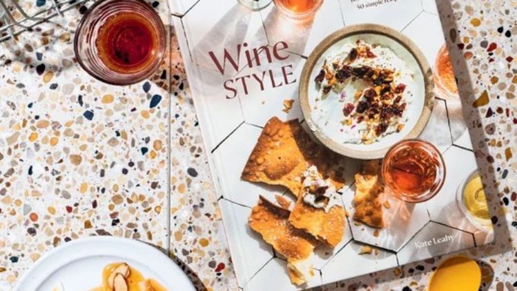 A cozy wine and cheese gathering featuring artisan cheese, crisp crackers, and rosé, inspired by Wine Style and perfect for effortless entertaining.